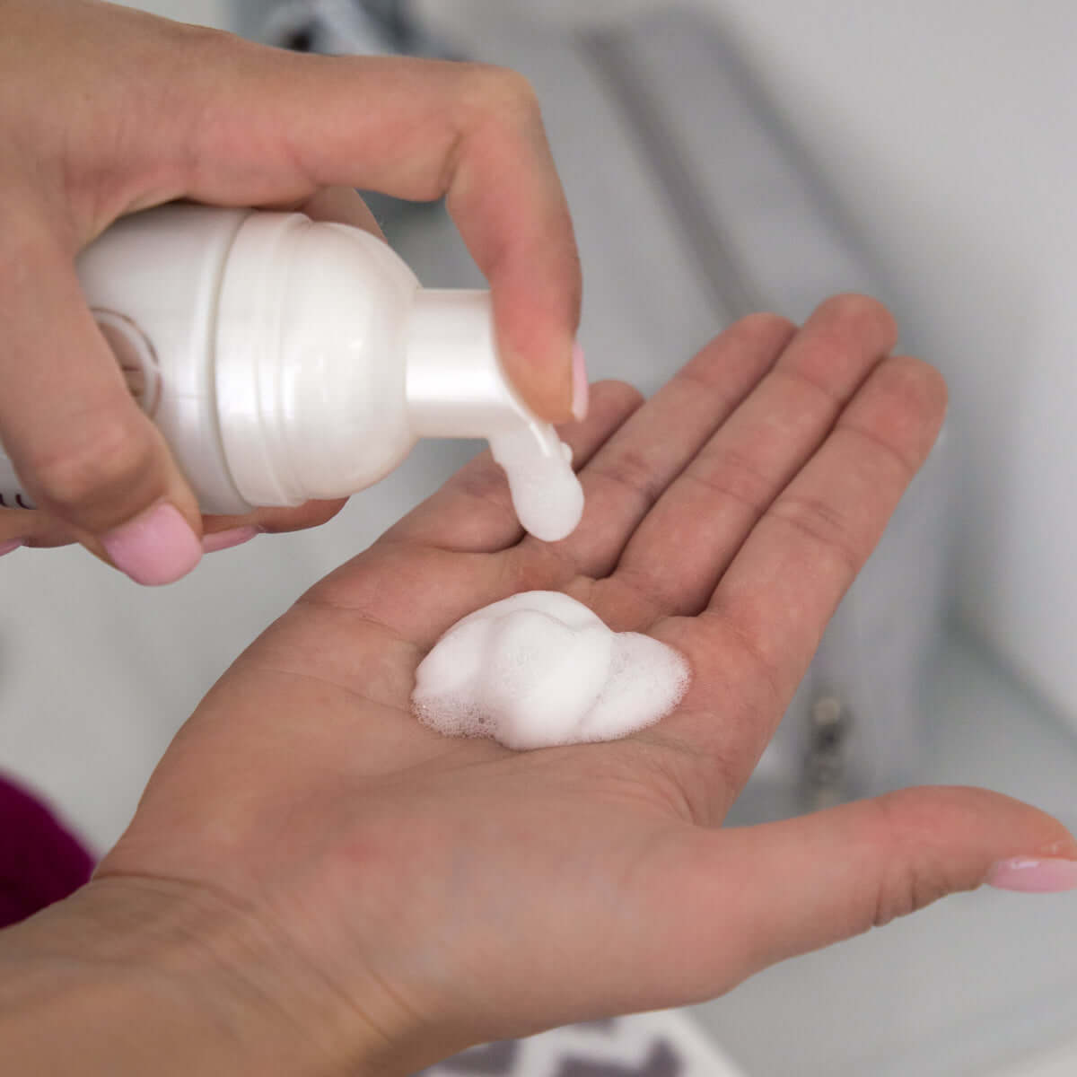 Skineffect Supreme Foam Cleanser being applied to a hand, showcasing its rich and moisturizing formulation.