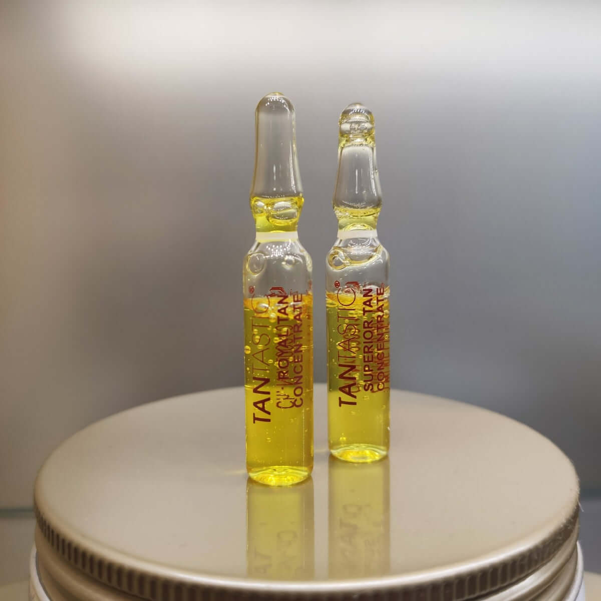 TanTastic Royal Tan Concentrates ampoules for facial tanning, enhancing melanin production for a deep, even tan.