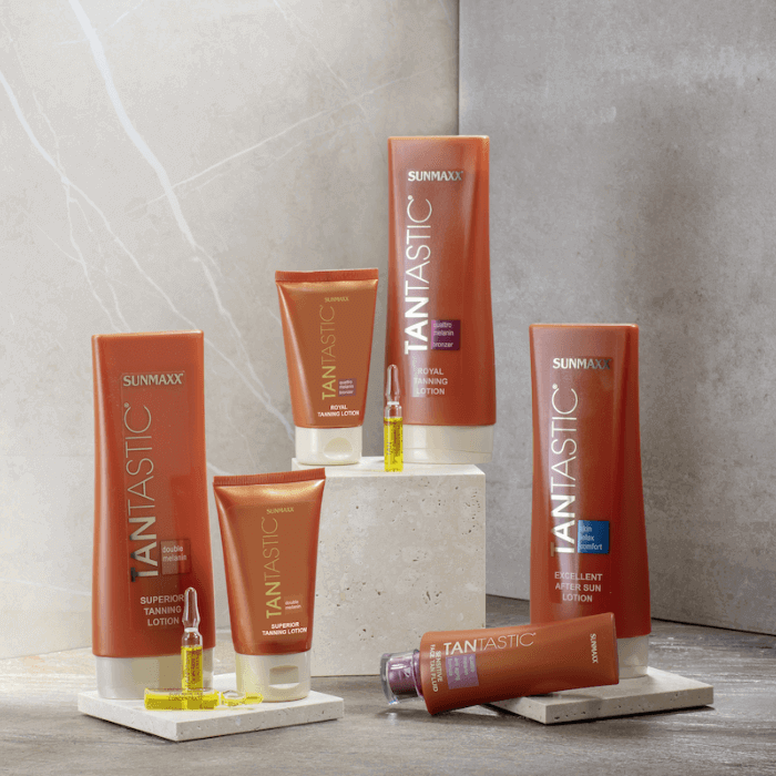 TanTastic tanning products collection featuring lotions for face and body in chic packaging.